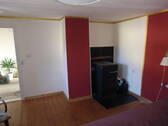 Schlafzimmer mit Ofen - 
