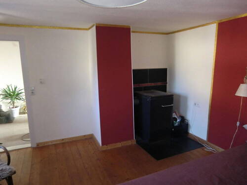 Schlafzimmer mit Ofen - 