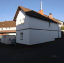 Außenansicht mit Garage - Kleines Haus Ebsdorfergrund - 145.000,00 EUR Kaufpreis, ca.  75,00 m² Wohnfläche