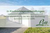 Bild 1 - Blick bis unters Dach! Moderner Bungalow mit offener, hoher Decke in zentraler Lage von Augustfehn!
