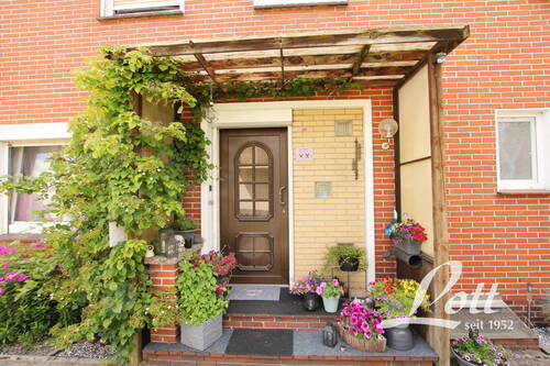 Hauseingang - Doppelhaushälfte mit 68,10 m² in Apen / Augustfehn zum Kaufen