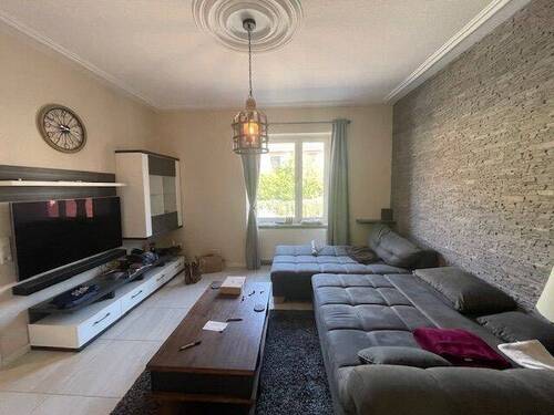 Wohnzimmer im EG - 8 Zimmer Doppelhaushälfte zum Kaufen in Rammelsbach