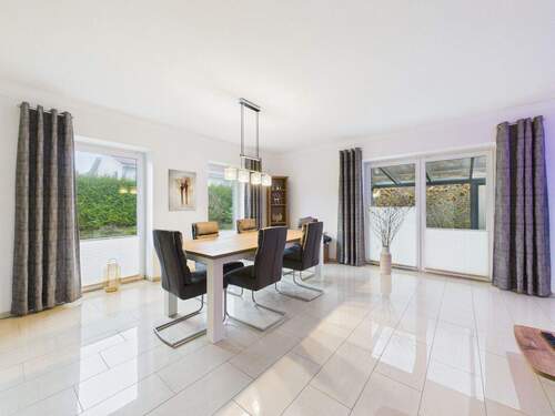 Wohnzimmer - Einfamilienhaus mit 148,70 m&sup2; in Husum zum Kaufen