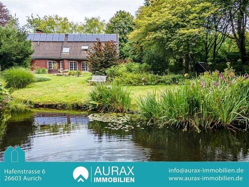 Außenansicht Gartenseite - 8 Zimmer Mehrfamilienhaus, Wohnhaus zum Kaufen in Aurich