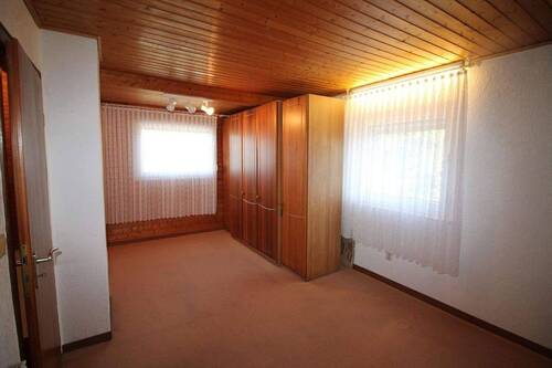 OG Schlafzimmer mit Blick in den Garten - 