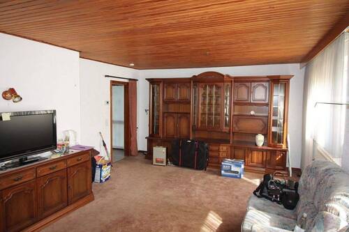 EG Wohnzimmer mit Blick zum Eingang - 