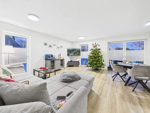 Wohnzimmer - Modernes Wohnen auf höchstem Niveau - barrierefreie 3-Zimmer-Wohnung mit zwei Balkonen