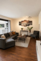 Wohnzimmer - Etagenwohnung mit 95,00 m&sup2; in Mülheim an der Ruhr zum Kaufen