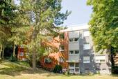 Vorderansicht Gebäude - Moderne 3-Zimmerwohnung mit Blick ins Grüne!
