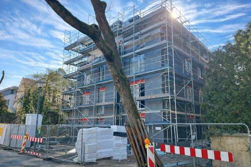 Strassenansicht im Bau - 675.000,00&nbsp;EUR Kaufpreis, ca.&nbsp; 97,20&nbsp;m&sup2;&nbsp;Wohnfl&auml;che