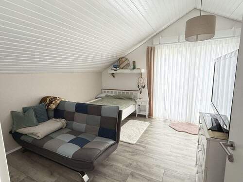 Schlafzimmer im Dachgeschoss - 