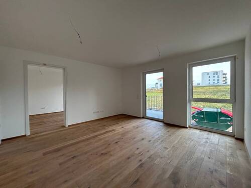 Wohnzimmer - Kompakte und moderne 2,5-Zimmerwohnung Wohnung Nr. 5 im 1. OG