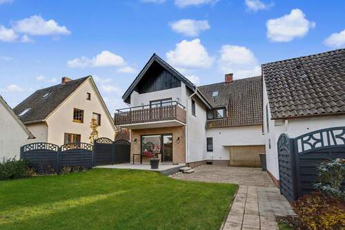 Hinteransicht - 8 Zimmer Mehrfamilienhaus, Wohnhaus zum Kaufen in Melle