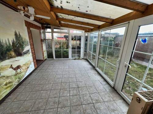 Der Wintergarten bietet ein ganzjähriges Wohngefühl wie im Freien - 