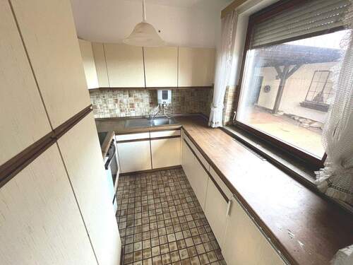 Funktionale Arbeitsküche im Erdgeschoss - 