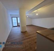 Komplett neu renovierte 2 Zi.-DG-Wohnung in bester Lage von Raubling- super vermietet mit 4,40 %!