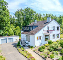 Großzügiges Zweifamilienhaus auf parkähnlichem Grundstück in Vögelsen