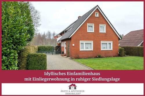 Ärzte & Apotheker Immobilien - Idyllisches Einfamilienhaus mit Einliegerwohnung in ruhiger Siedlungslage
