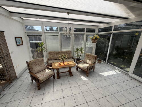 Wintergarten Bungalow - Einfamilienhaus im Bungalowstil mit Einliegerwohnung