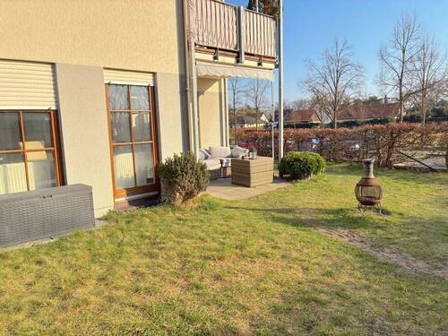 Außenansicht - 4-Zimmer Terrassenwohnung (Maisonette) mit Garten und Garage