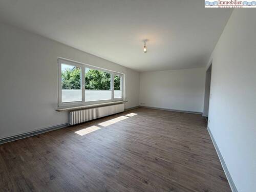 Wohnzimmer - Einfamilienhaus mit 94,70 m&sup2; in Husum zum Kaufen