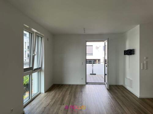 Wohnbereich mit Zugang zum Balkon.. - Etagenwohnung mit 117,00 m&sup2; in Weyhausen zum Kaufen