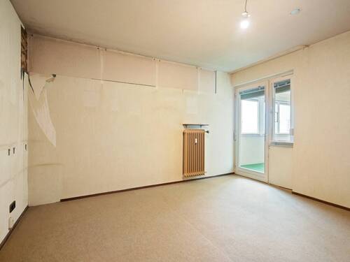 Schlafzimmer mit Zugang auf den Balkon - 