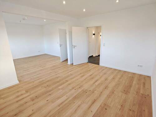 Wohnzimmer - Doppelhaushälfte mit 110,00 m&sup2; in Werther zur Miete