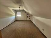 Zimmer im Dachgeschoss - 