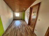 Zimmer im Dachgeschoss - 