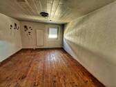 Zimmer im Dachgeschoss - 