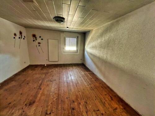 Zimmer im Dachgeschoss - 