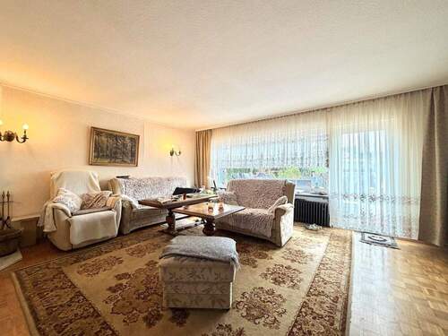 Wohnzimmer EG - 5 Zimmer Einfamilienhaus zum Kaufen in Frankfurt am Main