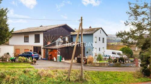 Außenansicht 3 - 9 Zimmer Einfamilienhaus zum Kaufen in Lollar