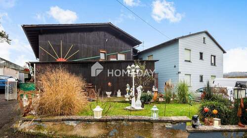 Außenansicht 2 - 9 Zimmer Einfamilienhaus in Lollar