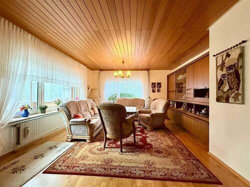 Wohnzimmer - 6 Zimmer Mehrfamilienhaus, Wohnhaus zum Kaufen in Südbrookmerland