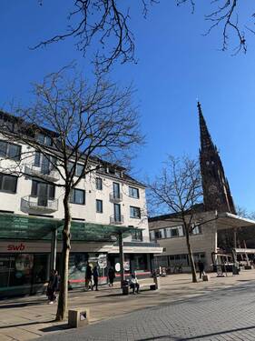 2025-02_mittags_Bürger mit Kirchenturm.jpeg - 