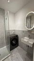 Badezimmer mit Waschmaschine - 