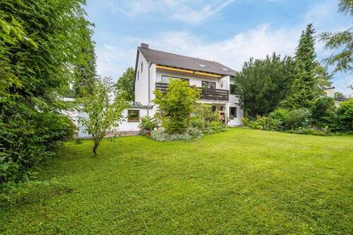 Rueckansicht - AIGNER - Vielseitig nutzbares Mehrparteienhaus mit großzügigem Grundstück in Gröbenzell!