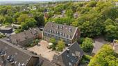 Titel - Voll vermietetes Mehrfamilienhaus auf historischem Gutshof