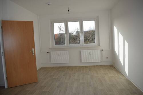 Wohnzimmer (Muster) - Stilvoll ganz oben: Urbaner Rückzugsort mit Raumgefühl