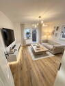 Wohnzimmer möbliert - Frisch renovierte 3-Zimmer-Wohnung mit Südbalkon, Garage & Top-Potenzial