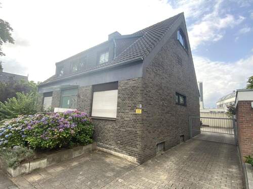 Seitenansicht - Mehrfamilienhaus, Wohnhaus mit 295,00 m&sup2; in Münster zum Kaufen