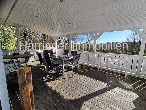 Blick ins Grüne von der großen Terrasse - Einfamilienhaus mit 202,00 m&sup2; in Buchholz in der Nordheide zum Kaufen