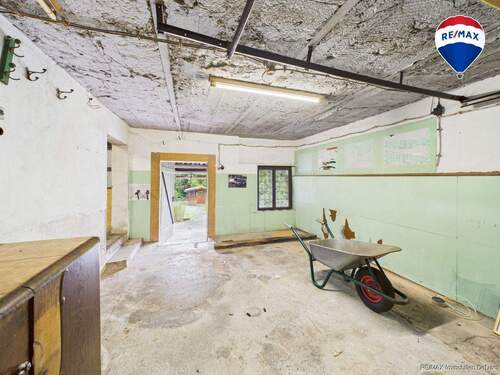 RE/MAX Immobilien DeLux Einfamilienhaus Nalbach Garage - 