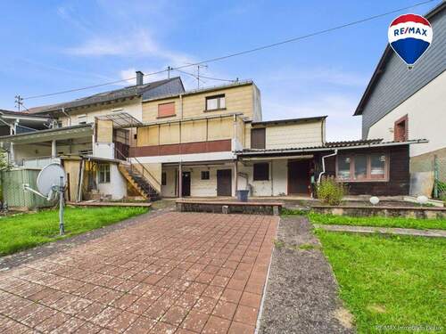 RE/MAX Immobilien DeLux Einfamilienhaus Nalbach Rückansicht - 