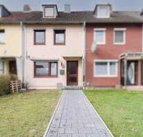 Perfekt für junge Familien - gemütliches Reihenhaus mit Garten und Garage in Stade