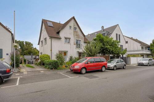 Straßenansicht - 2 Zimmer Doppelhaushälfte zum Kaufen in Düsseldorf