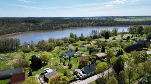 Blick von oben - Mehrfamilienhaus, Wohnhaus mit 260,00 m&sup2; in Reimershagen zum Kaufen