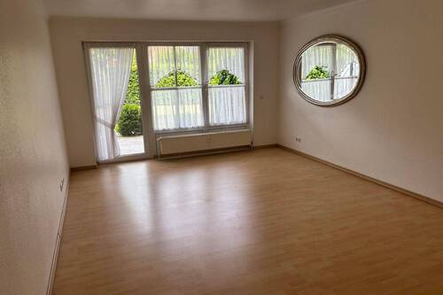 Wohnzimmer mit Terrassenzugang - Etagenwohnung mit 60,00 m&sup2; in Timmendorfer Strand zum Kaufen